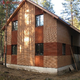 House made of SIP panels with a brick finish (Poltava)